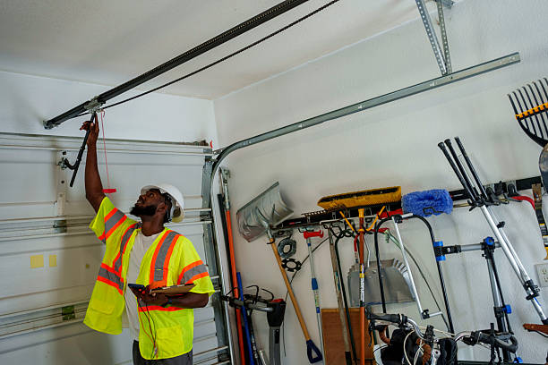 Professional Garage Door Panel Replacement technician working in Mentone, IN
